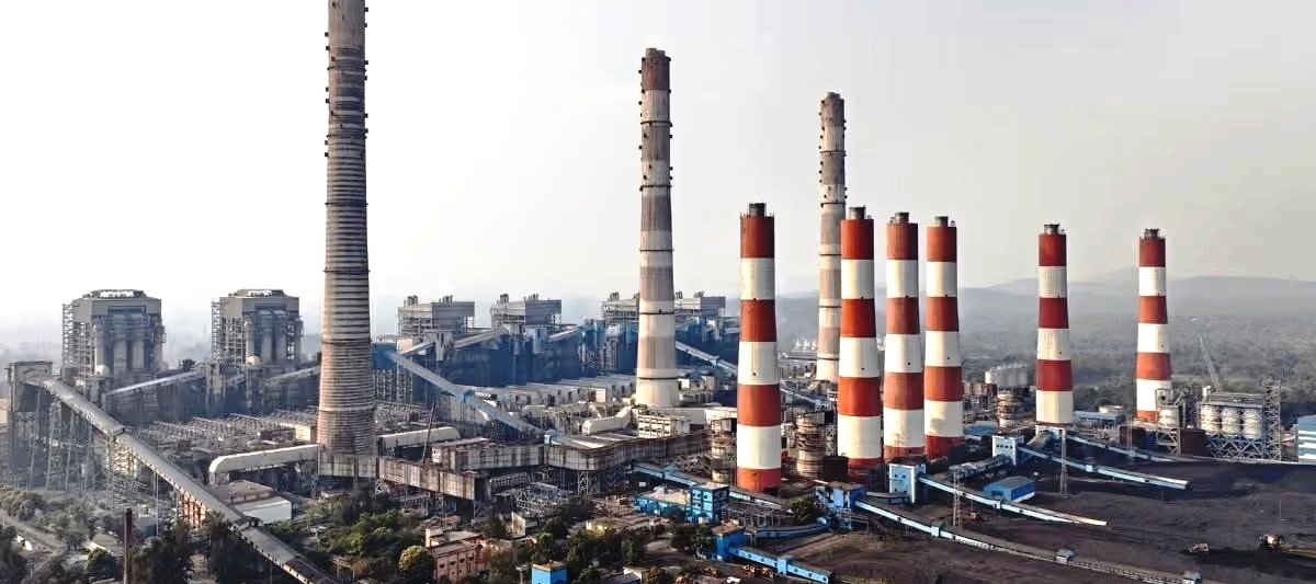 Thermal power station with its chimney stacks, the source of the fly ash