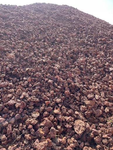 Bauxite, a heap of reddish-brown nodular ore